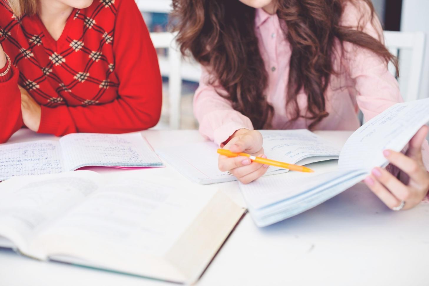 Financial professionals collaborating on investment analysis techniques and market research